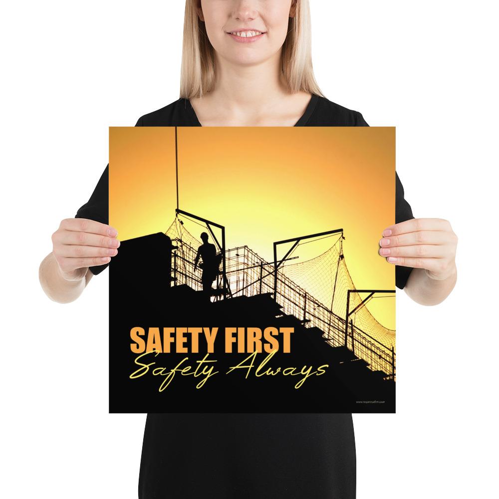 A workplace safety poster showing a construction site and construction workers being silhouetted by a bright and beautiful sunset of different shades of orange with the slogan safety first, safety always.