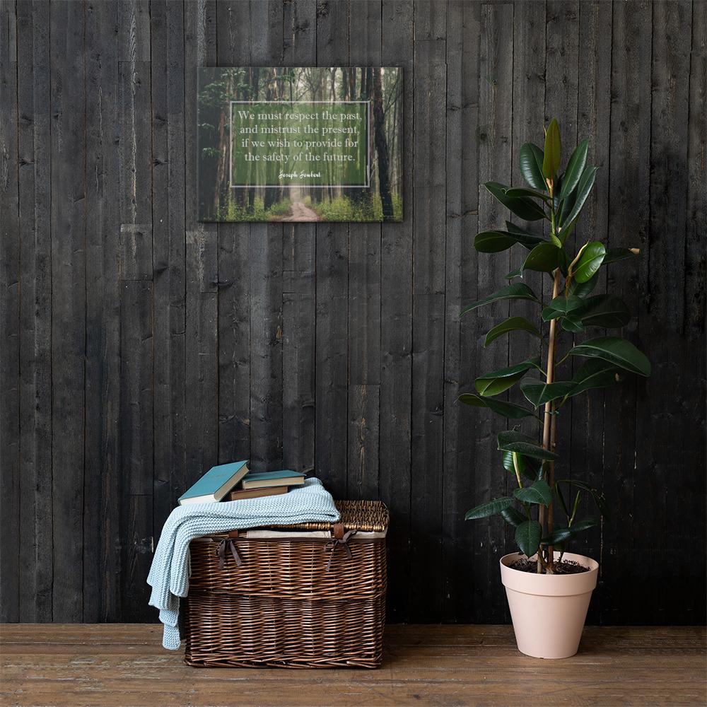A workplace safety poster of a lush green forest with a footpath cutting directly in the middle winding down the forest with the a safety quote by Joseph Joubert centered on the poster.