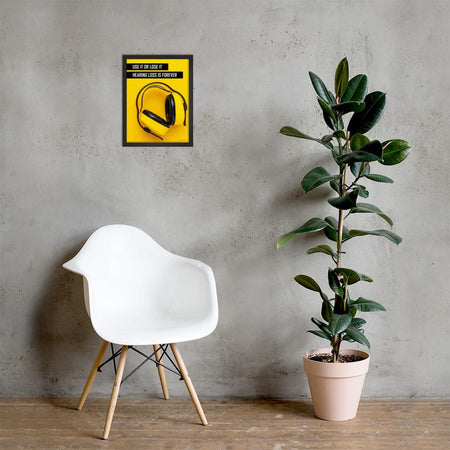 A hearing protection safety poster depicting bright yellow ear muffs on a bright yellow background in the bottom right corner with a bold safety slogan in the upper left corner.