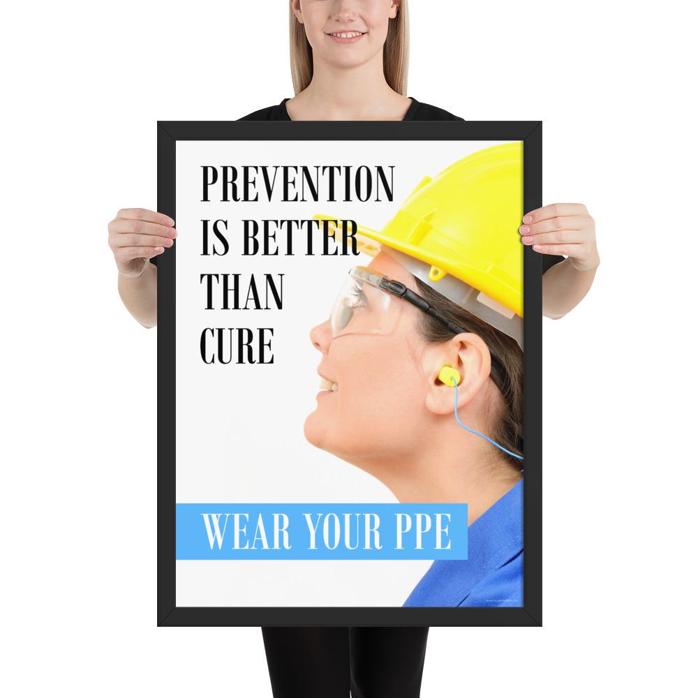 A safety poster showing a close-up of a worker wearing safety glasses, a hard hat, and earplugs with the slogan prevention is better than cure, wear your PPE.