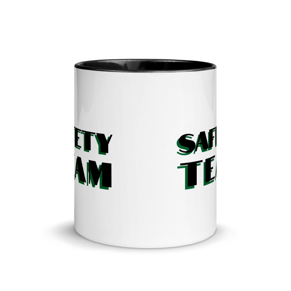 White ceramic mug with "Safety Team" in bold text across the side, with black color on the inside, the rim, and the handle.