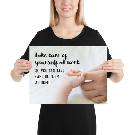 A safety poster showing a close-up of a baby's tiny hand wrapped around their parent's finger with the slogan take care of yourself at work so you can take care of them at home.