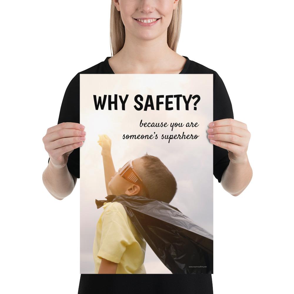A workplace safety poster showing a young child with a makeshift cape and mask striking a superhero pose with the slogan why safety? because you are someone's superhero.