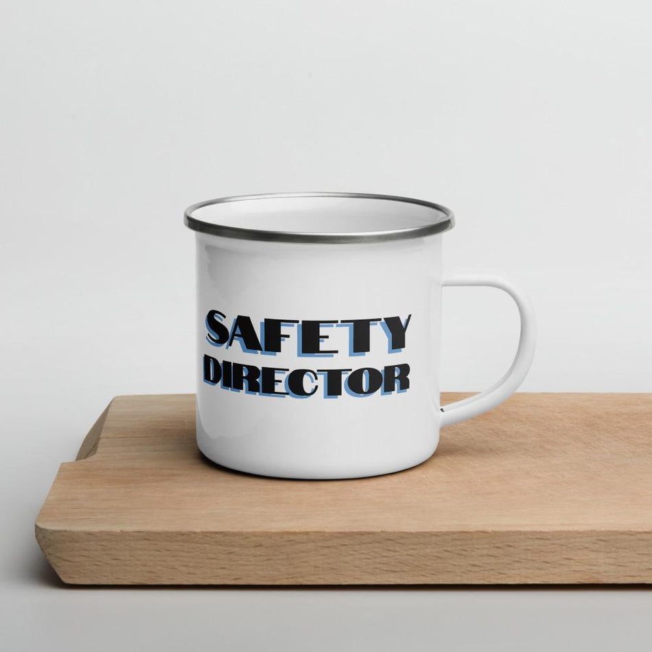 White metal mug with a silver rim with "Safety Director" in bold text with a blue drop shadow across the side.