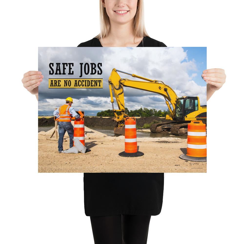 A safety poster showing a construction worker on a worksite outside with a big excavator in the background and the slogan safe jobs are no accident against the bright blue sky.