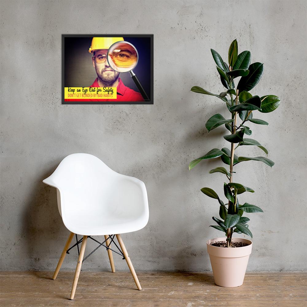 A workplace safety poster showing a portrait of a man wearing a hardhat and safety glasses with a magnifying glass magnifying one eye with the slogan, keep an eye out for safety, don't get blinded by bad habits.