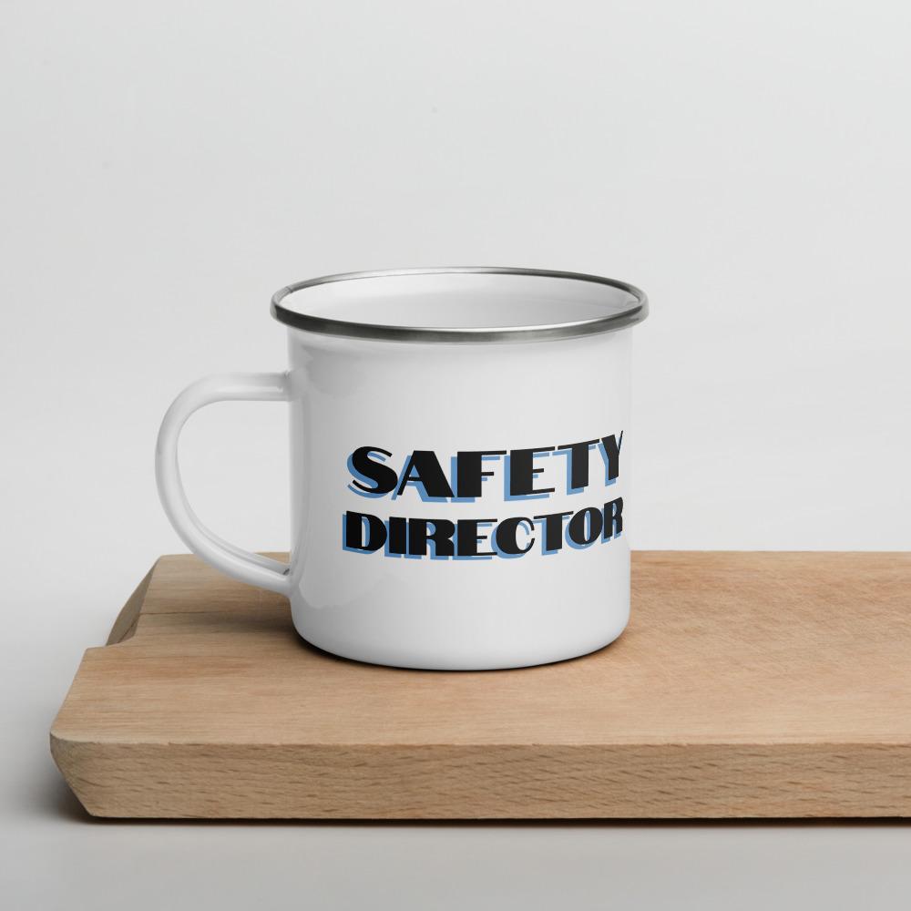 White metal mug with a silver rim with "Safety Director" in bold text with a blue drop shadow across the side.