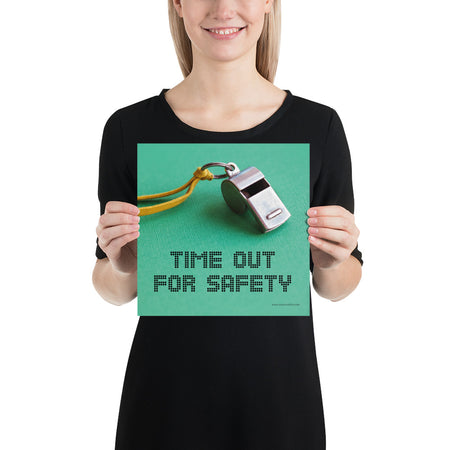 A safety poster showing a close-up of a whistle with the slogan "time out for safety."