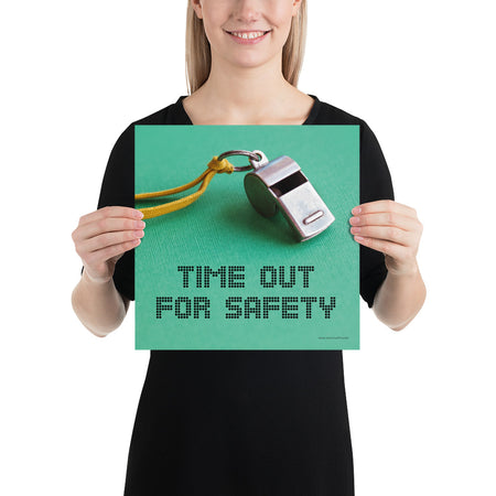 A safety poster showing a close-up of a whistle with the slogan "time out for safety."