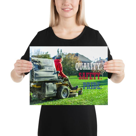 A workplace safety poster showing a man mowing a lawn on a sitting mower with the words quality, safety, pride in white, red, and blue, respectively.