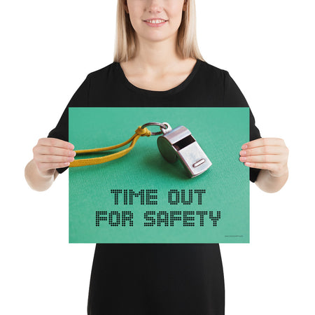 A safety poster showing a close-up of a whistle with the slogan "time out for safety."