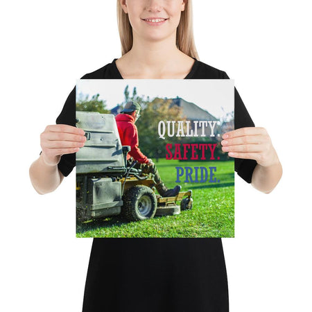 A workplace safety poster showing a man mowing a lawn on a sitting mower with the words quality, safety, pride in white, red, and blue, respectively.