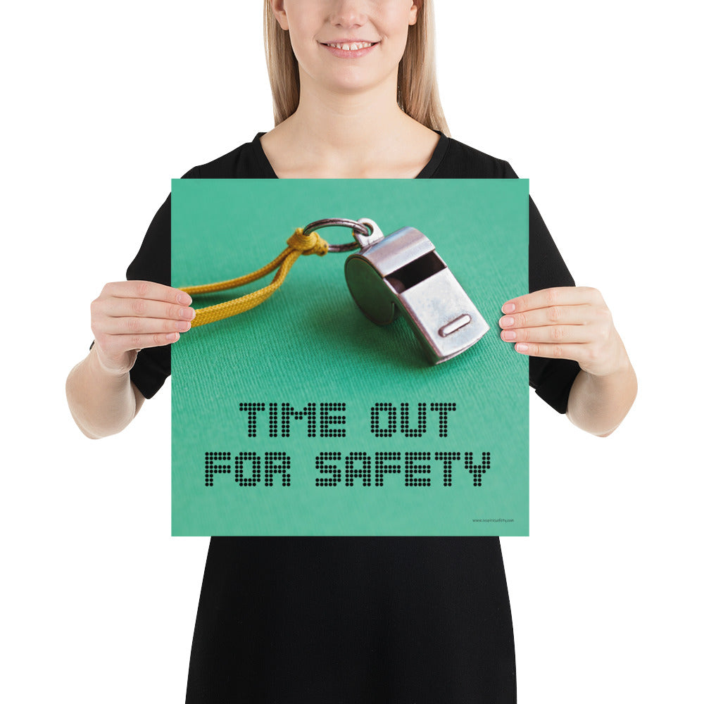 A safety poster showing a close-up of a whistle with the slogan "time out for safety."