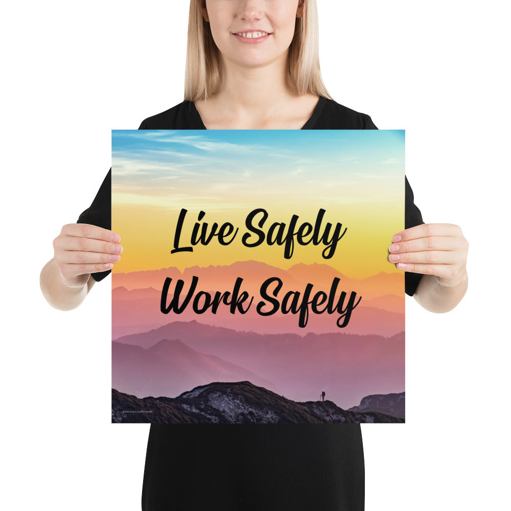 A safety poster showing a mountain range with a beautiful gradient in the sky of blue, yellow, and pink with the safety slogan "Live Safely Work Safely."