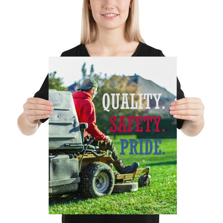 A workplace safety poster showing a man mowing a lawn on a sitting mower with the words quality, safety, pride in white, red, and blue, respectively.