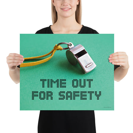 A safety poster showing a close-up of a whistle with the slogan "time out for safety."