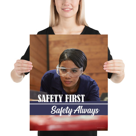 A safety poster showing a woman in safety glasses working in a woodshop with the slogan "Safety first, safety always" below her.