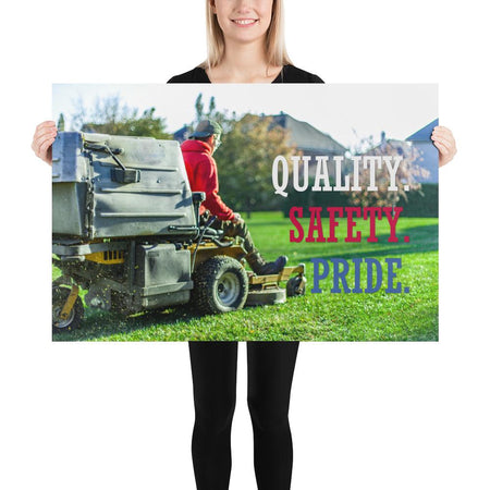 A workplace safety poster showing a man mowing a lawn on a sitting mower with the words quality, safety, pride in white, red, and blue, respectively.