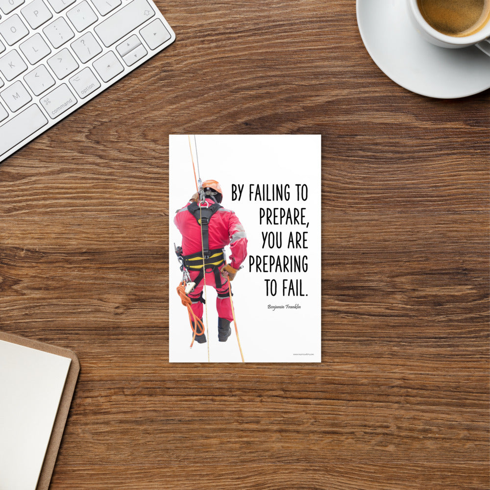 A safety print showing a person in full fall protection gear with a quote by Ben Franklin that says "By failing to prepare, you are preparing to fail."