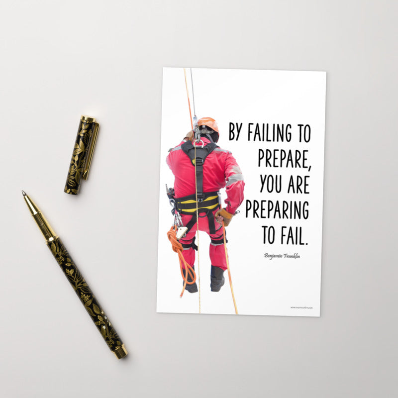 A safety print showing a person in full fall protection gear with a quote by Ben Franklin that says "By failing to prepare, you are preparing to fail."