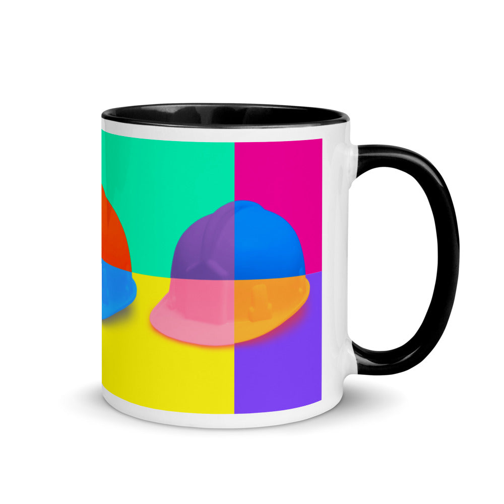 White ceramic mug with a bold hard hat pop art print with black color on the inside, the rim, and the handle.