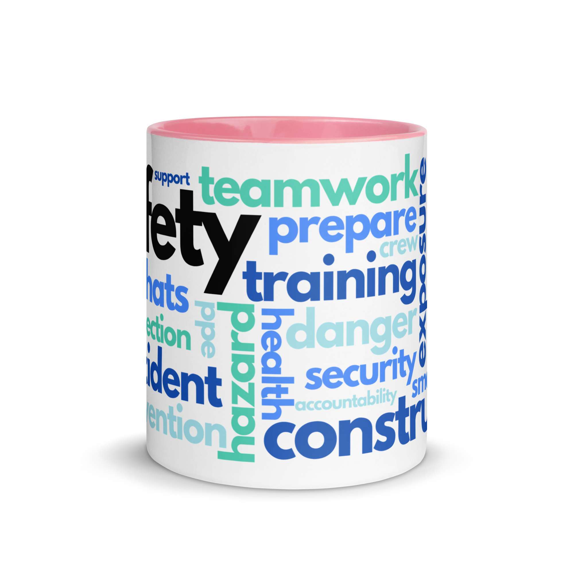 White ceramic mug with safety terms like hard hats, protection, and encourage, in a various shades of blue across the mug with a pink rim, inside, and handle.