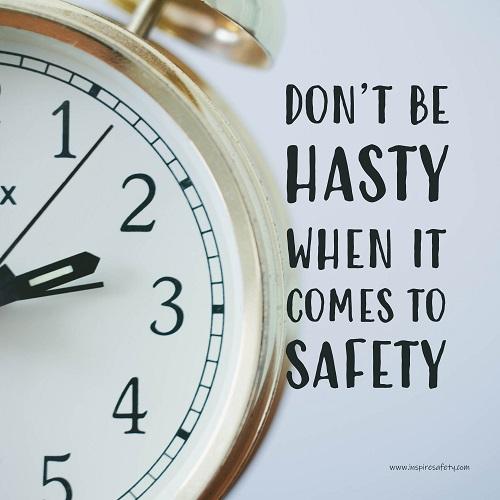 A workplace safety poster showing a close-up of a clock face with the slogan don't be hasty when it comes to safety.