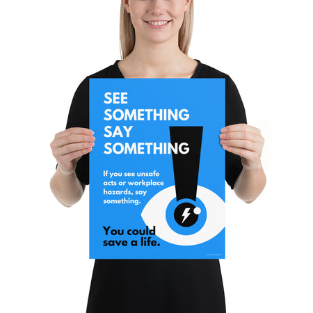 A workplace safety poster with a bright blue background an an eye with an exclamation point coming from the pupil and a lightning bolt in the middle of the pupil with text that says "See Something Say Something" in bold lettering with the words "If you see unsafe acts or workplace hazards, say something. You could save a life."