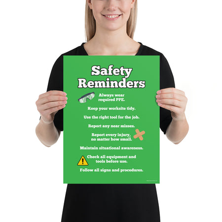 An workplace safety poster with a bright green background and large text saying "Safety Reminders" with a list underneath it of various workplace safety tips.