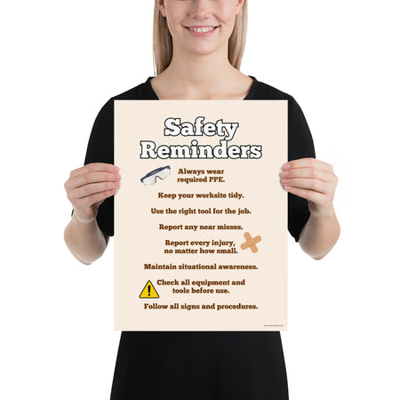 A workplace safety poster with a light tan background and large text saying "Safety Reminders" with a list underneath it of various workplace safety tips.