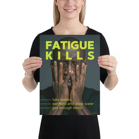 A workplace safety poster showing a black man with his face in his hands with large neon text saying "Fatigue Kills."