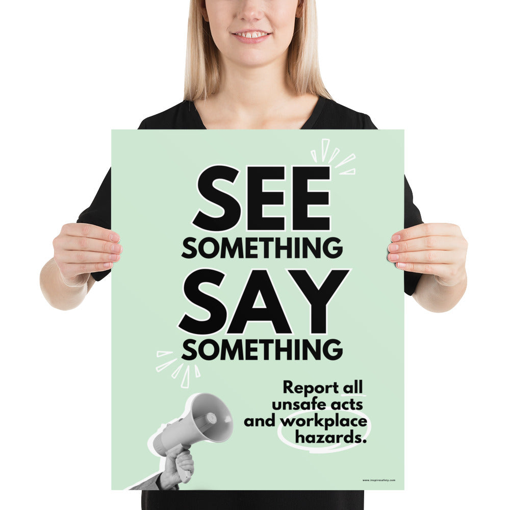 A workplace safety poster with a mint green background, and a greyscale hand holding a megaphone with large text saying "See Something, Say Something" and small text underneath it that says "Report all unsafe acts and workplace hazards" with white doodles to emphasize the text.