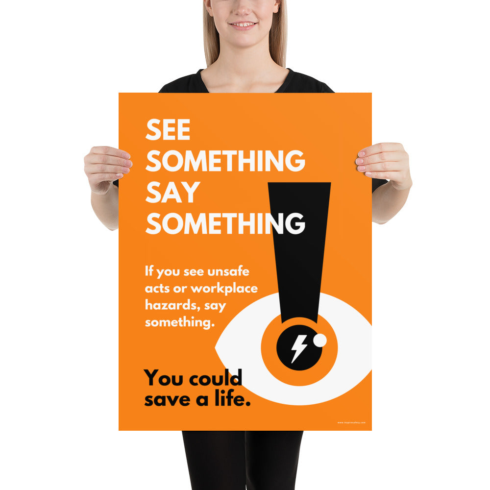 A workplace safety poster with a bright orange background an an eye with an exclamation point coming from the pupil and a lightning bolt in the middle of the pupil with text that says "See Something Say Something" in bold lettering with the words "If you see unsafe acts or workplace hazards, say something. You could save a life."