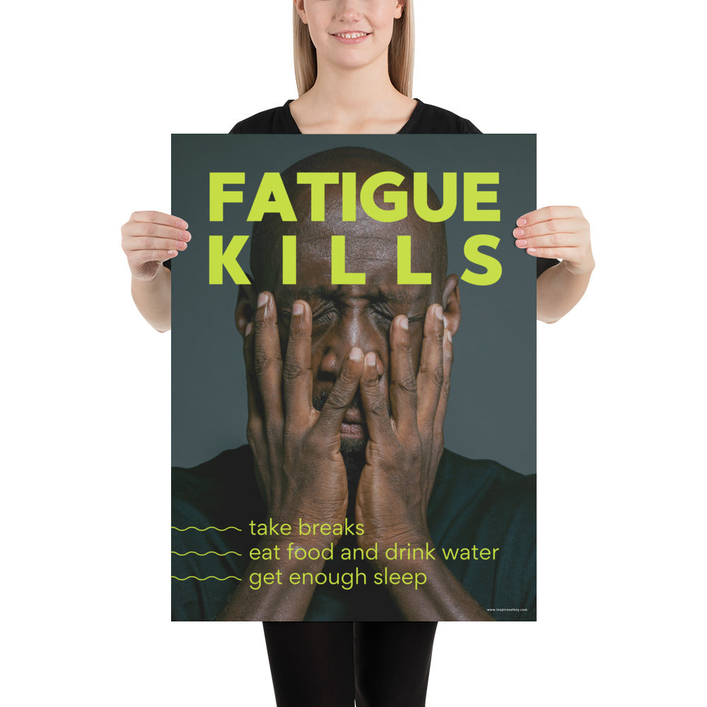 A workplace safety poster showing a black man with his face in his hands with large neon text saying "Fatigue Kills."