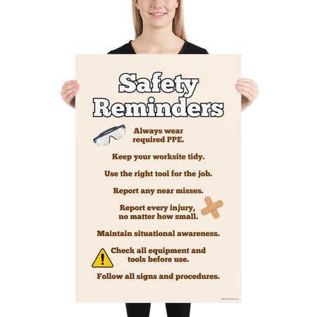 A workplace safety poster with a light tan background and large text saying "Safety Reminders" with a list underneath it of various workplace safety tips.