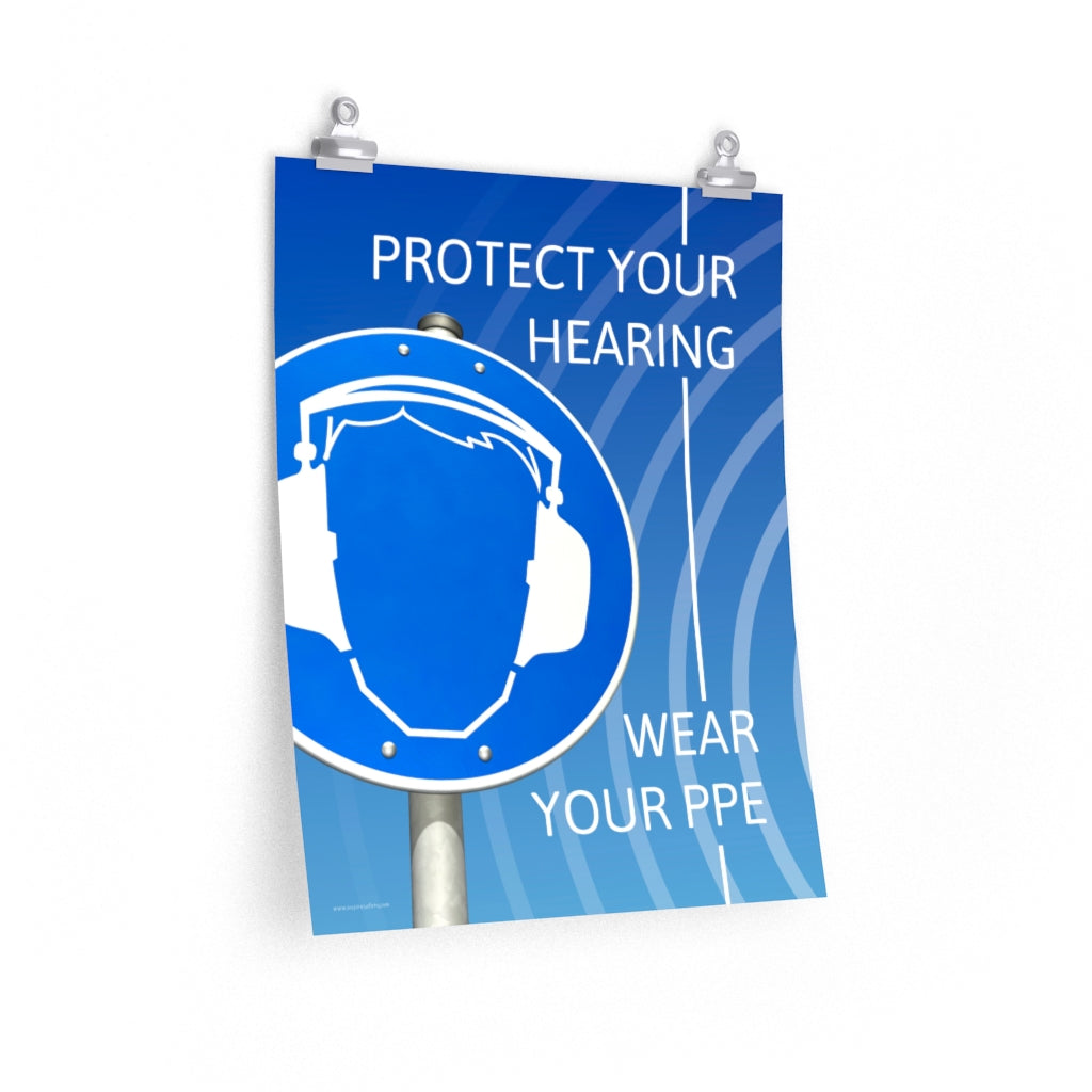 A hearing protection poster showing a bright blue construction sign with an illustration of a face wearing ear muffs with sound waves coming from the right and a safety slogan in the upper right and bottom right corners.