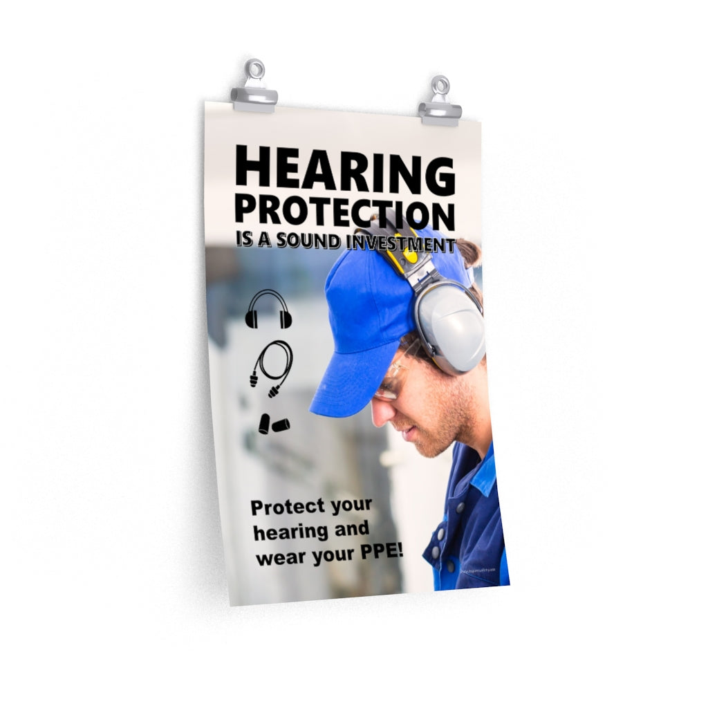An ear safety poster showing a close up of a man's profile wearing ear muffs and safety glasses with a safety slogan and infographics of hearing PPE all around him.