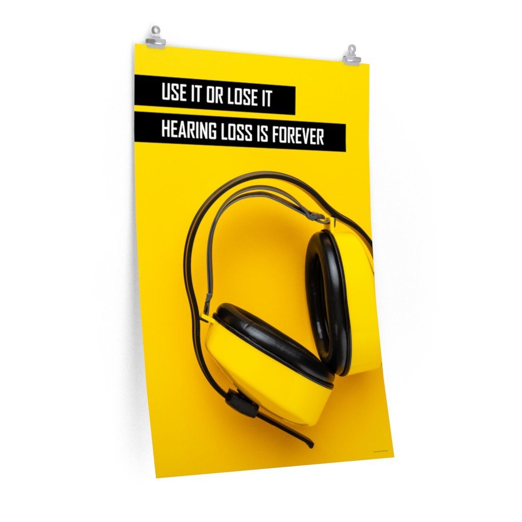 A hearing protection safety poster depicting bright yellow ear muffs on a bright yellow background in the bottom right corner with a bold safety slogan in the upper left corner.