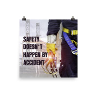 Safety poster that shows a construction worker wearing fall protection equipment with bridge in the background and a safety slogan that says "Safety doesn't happen by accident" in bold letters.