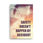 Safety poster showing a close up of 3 hands wearing gloves holding glass beakers and a safety slogan written in bottom right corner.