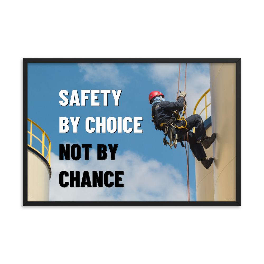 A fully harnessed man wearing a hard hat scaling the side of a building with a bright blue sky and clouds in the background with the text safety by choice, not by chance in bold text to his left.