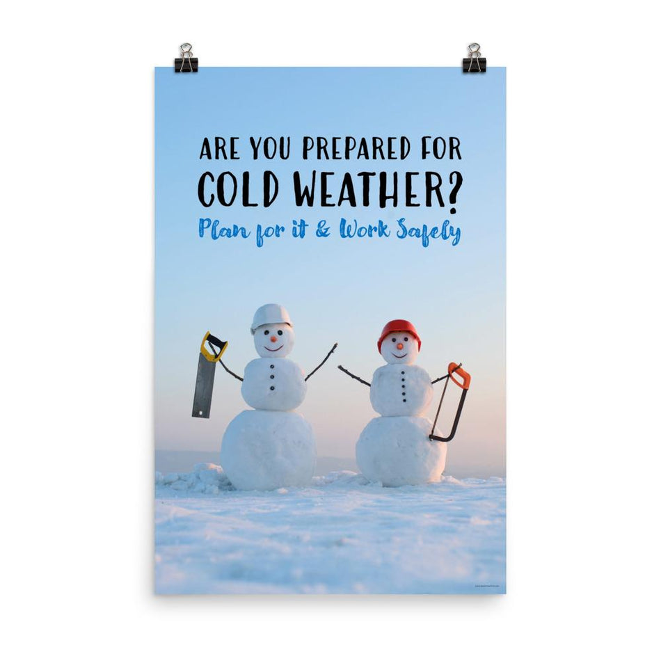 A safety poster showing two snowmen wearing hard hats and holding hand saws with the slogan are you prepared for cold weather? Plan for it and work safely.