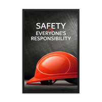 A workplace safety poster showing a red hard hat in front of a grey, industrial-looking background with the slogan safety is everyone's responsibility.