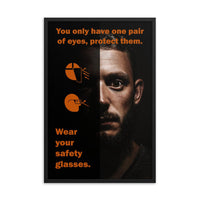 An eye safety poster of a close up of a mans face with his eyes wide open with text and PPE infographics covering his left eye.