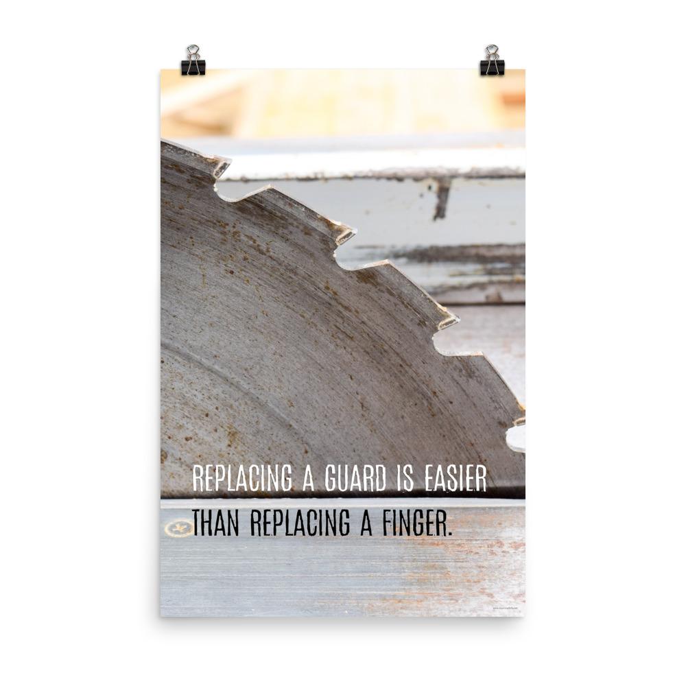 A workplace safety poster depicting a close up of a table saw blade in a workshop with a safety slogan on the bottom half of poster.