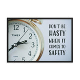 A workplace safety poster showing a close-up of a clock face with the slogan don't be hasty when it comes to safety.