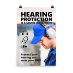 An ear safety poster showing a close up of a man's profile wearing ear muffs and safety glasses with a safety slogan and infographics of hearing PPE all around him.