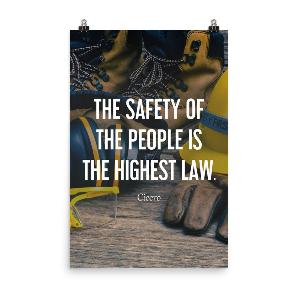 A safety poster showing a close-up of various PPE including safety glasses, ear muffs, gloves, a hard hat, and work boots with the quote by Cicero in the foreground.