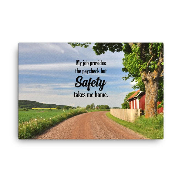 A workplace safety poster showing a beautiful sunny day in the countryside with a red barn on the right of a dirt road and text above the road saying my job provides the paycheck but safety takes me home.