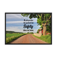 A workplace safety poster showing a beautiful sunny day in the countryside with a red barn on the right of a dirt road and text above the road saying my job provides the paycheck but safety takes me home.
